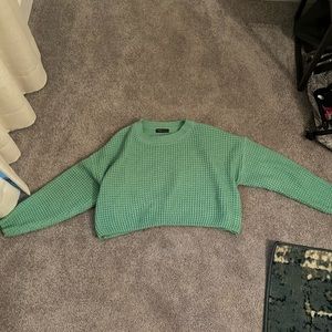 green sweater